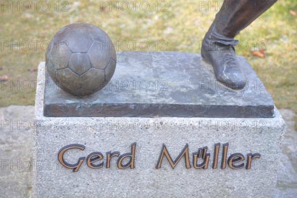 Memorial to soccer player Gerd Müller, German national team player, soccer legend, bronze