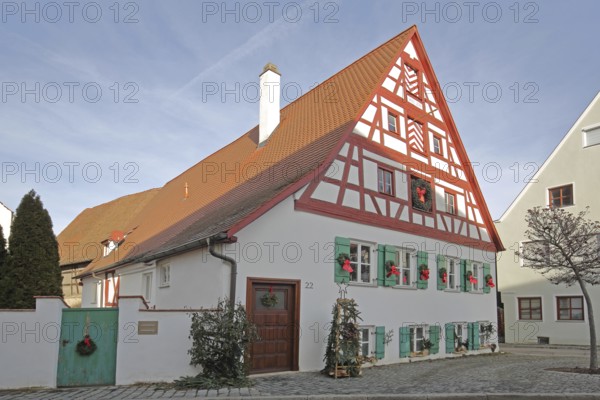 Historic half-timbered house built in 18th century with Christmas decoration, Bauhofgasse,