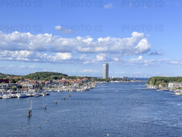 View over the Trave towards the mouth in the underground, the church of Travemünde and the Atlantic