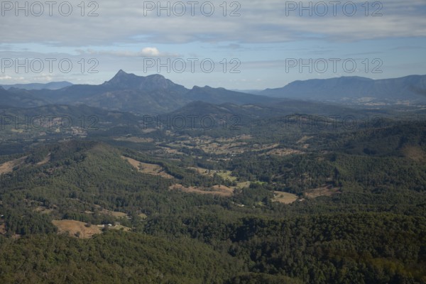 Clear blue sky with an open view across the valley toward Mount Warning (Wollumbin), captured from