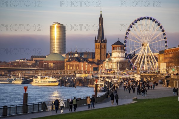 Rhine promenade in Düsseldorf, Ferris wheel, old castle tower, St. Lambert Basilica, old town, ERGO