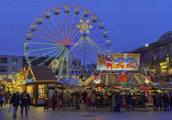 The Christmas market with the Ferris wheel in the evening, Hagen, Ruhr area, North