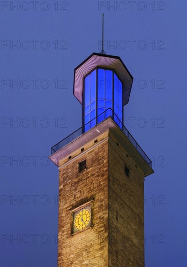 The illuminated and illuminated town hall tower in the evening, Hagen, Ruhr area, North