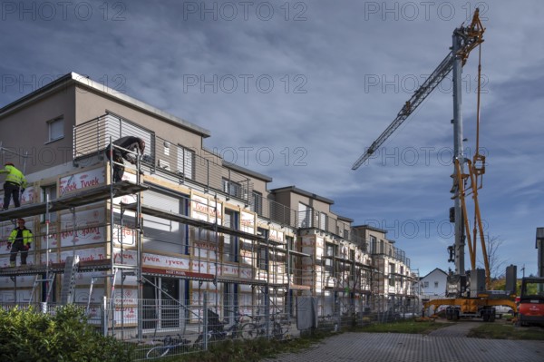 Thermal insulation is being installed on a residential block, Eckental, Mittelfranken, Bavaria,