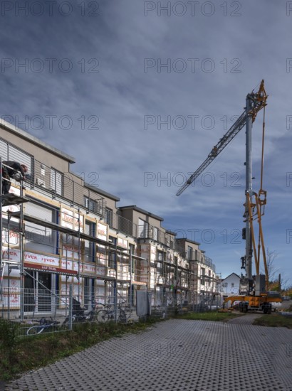 Thermal insulation is being installed on a residential block, Eckental, Mittelfranken, Bavaria,