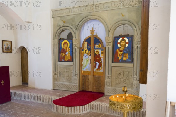 Orthodox church interior with magnificent icons and elegant altar, St. George Church, Old Town,