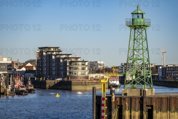 Skyline of Bremerhaven, seen across the Weser, lighthouse at the mouth of the Geeste, harbour of