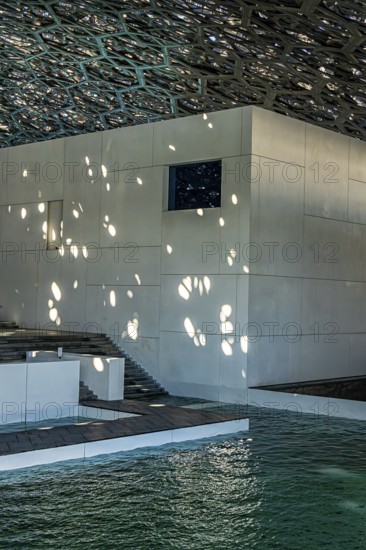 Interior design in Louvre Abu Dhabi, art museum by French architect Jean Nouvel, buildings on