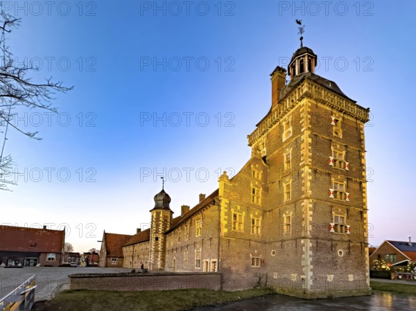 Observatory Tower of Raesfeld Castle stands in Wassergraben behind part of Vorburg, Raesfeld Water