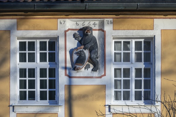 Bear with shield, the coat of arms of the Lords of Egloffstein, from 1664, at the former district