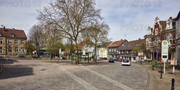 Niedersprockhövel bus stop church, bus platform, general architecture, houses, residential
