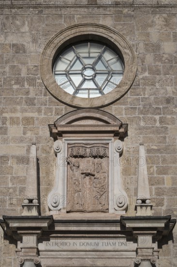 Relief above the entrance to the parish church of St. Quirinus, Tegernsee Abbey, castle with