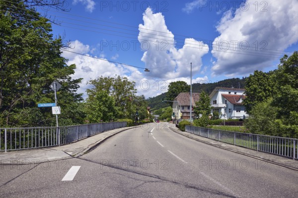 Car bridge and footbridge, metal railings, general architecture, houses, sidewalk, road, lanes,