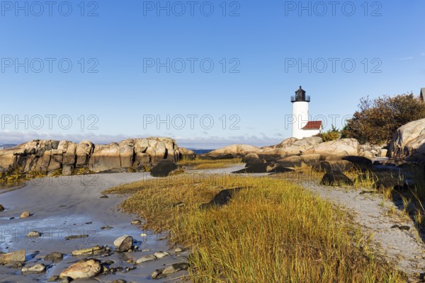 Annisquam Harbor lighthouse lighthouse, rocky coastline, historic Wigwam Point in Gloucester, Cape