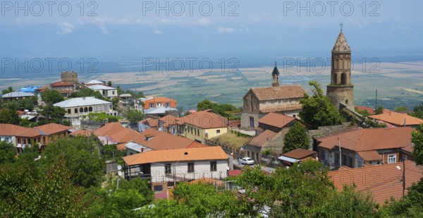 Panoramic view of a city with church buildings and surrounding countryside, Church of St. George,