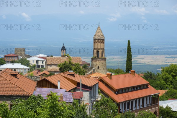 View of an urban landscape with a church tower and views to the horizon, Church of St. George,