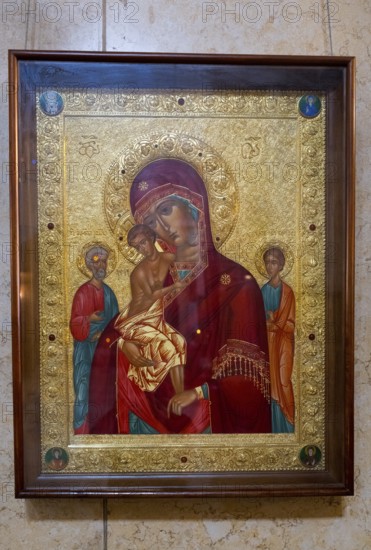 Icon of the Mother of God and Child, set in an ornately decorated golden frame, Sameba Cathedral,