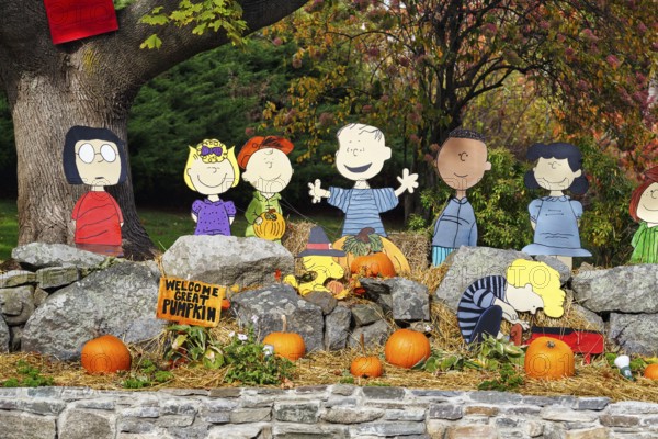 Peanuts cut out wooden figures, comic book character Charlie Brown and his friends in the front