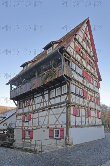 Historic half-timbered house Hoher Will built in 1697 with red shutters, multi-storey, Achgasse,