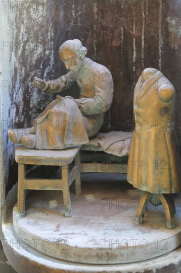 Tailor working clothes at Bonifatius Stirnberg's guild fountain 1983, modern art, bronze sculpture,