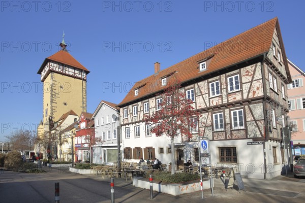 Historic Tübingen Gate built in 1330 and half-timbered house with street shop, city gate, city