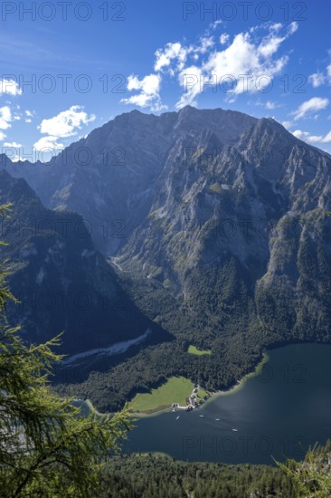 Deep view from Feuerpalfen of Lake Königssee with St. Bartholomä and some ships as well as the