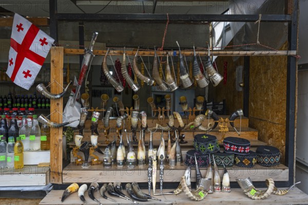Market stall with Georgian souvenirs such as drinking horns and handmade items, Mtskheta, Mtskheta,