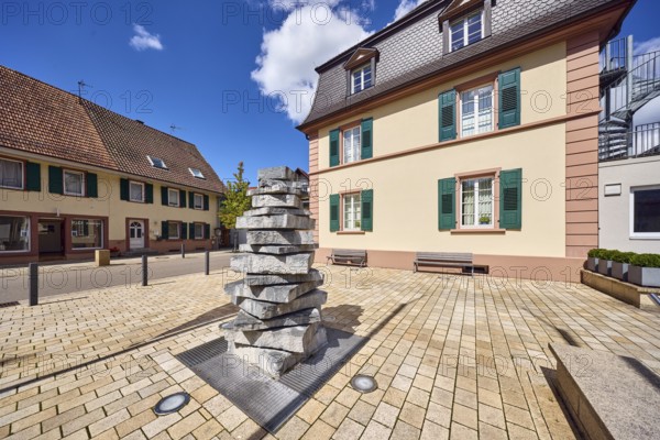 Buildings, town hall, residential and commercial buildings, benches, stacked stones, barrier