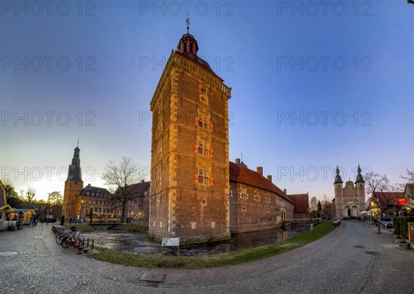 Panoramic photo in winter on winter evening from left on the edge of the picture Raesfeld Castle in