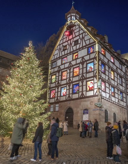 The historic Pilate House with the annual advent calendar, in evening lighting, Am Tiergärtnertor,