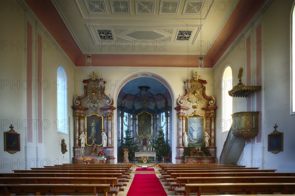 Interior view, nave and choir room, altar, Saint Barbara Catholic church from 1783, Christmas