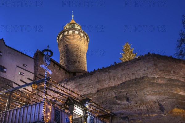 Illuminated Sinwell Tower, built in the 13th century, blue evening sky, Kaiserburg, Nuremberg,
