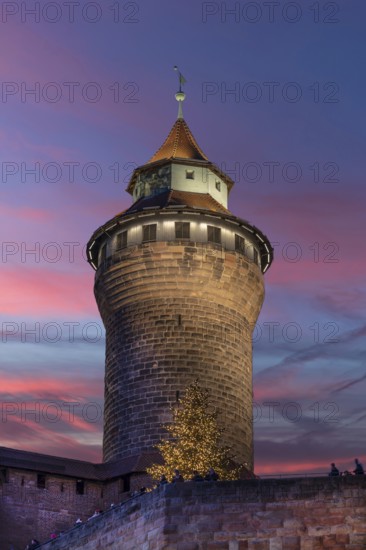 Historic Sinwell Tower, in the evening sky, built in the 13th century, Kaiserburg, Nuremberg,