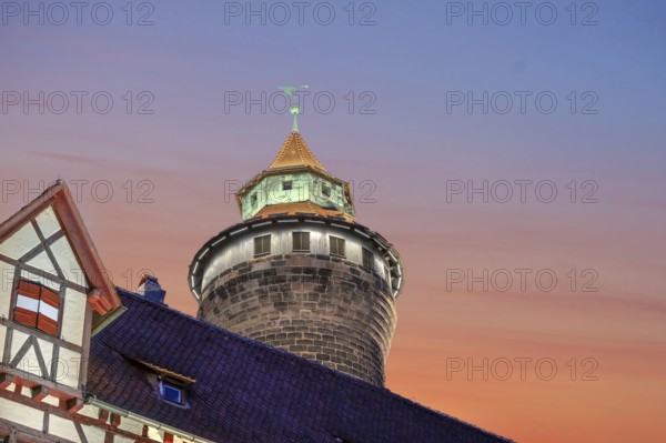 Sinwell Tower built in the 13th century, on the Nuremberg Kaiserburg in the evening lighting,