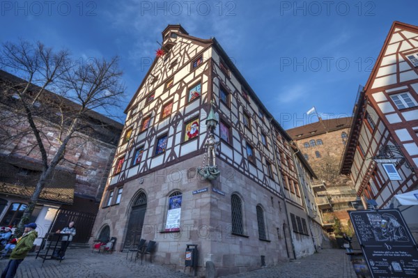 Historic Pilate House with the annual advent calendar in the evening light, Tiergärtnertor,
