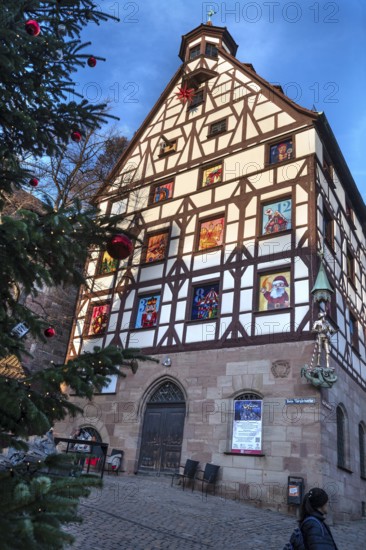 Historic Pilate House with the annual advent calendar in the evening light, Tiergärtnertor,