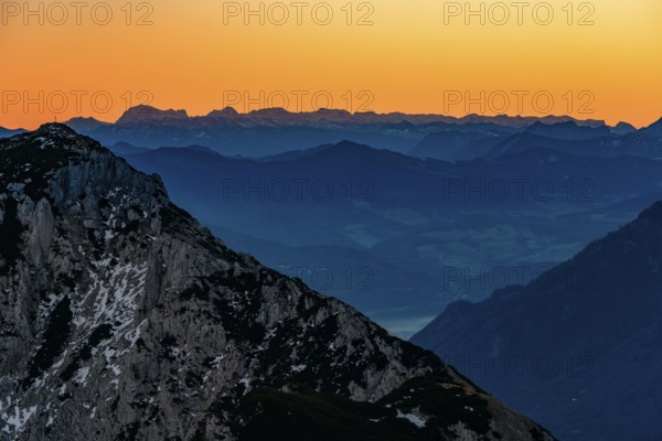 Dawn in the mountains, view of silhouette of mountain ranges, in front Hochstaufen, Zwiesel, Bad