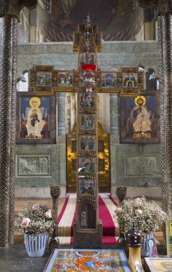 Magnificent decoration of a church altar with cross, icons and floral decorations, Svetitskhoveli