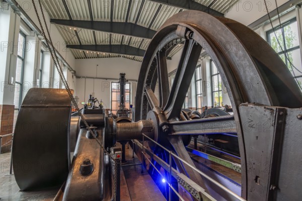 Large steel wheel of a steam engine in the coal world, Steinkohlebergbau Sachsen Museum, Oelsnitz