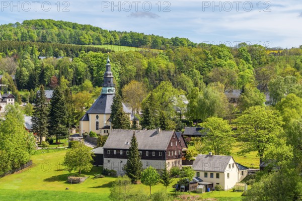 Residential buildings and landmarks of the historic mountain church, in the back forest, health