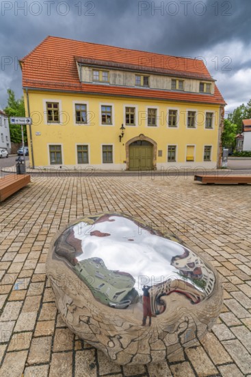 Sculpture, art installation Trashstone 689 in the form of a silver nugget by artist Wilhelm Mundt,