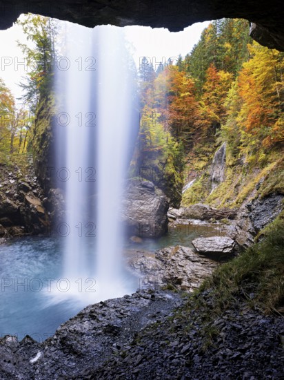 Waterfall mountain list in autumn-colored surroundings, Linthal, Klausenpass, Canton of Glarus,