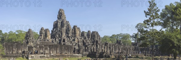 Panoramic picture of the south side of Bayon Temple, with huge stone-carved faces of Bodhisattva