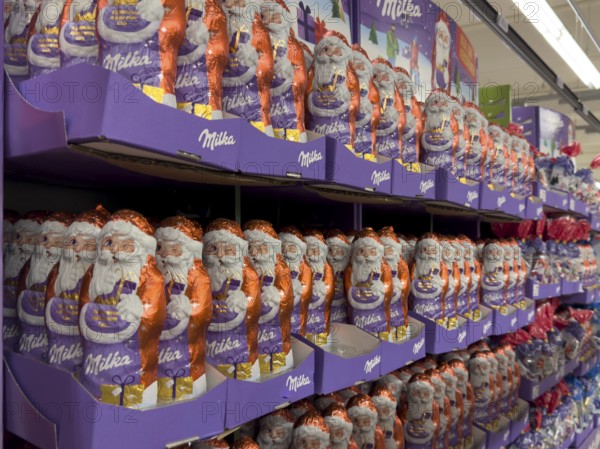 Huge large shelf with chocolate Santa Claus chocolate Santa Claus chocolate Santa Claus chocolate