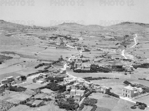 View from citadel in Victoria over countryside looking towards Ghasri and Giordan lighthouse in