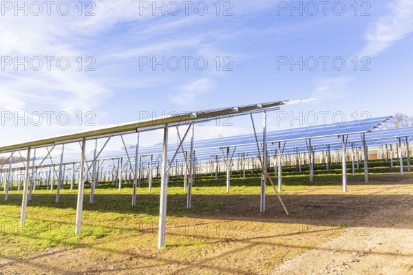 Construction of solar plant series under blue skies, Energiewende, construction of PV open space,