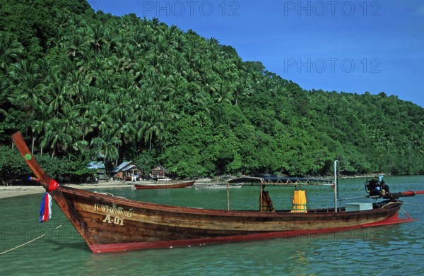 Bamboo huts, longtail boat on Ko Phi Phi Don beach, two years in front of the tsunami, Thailand,