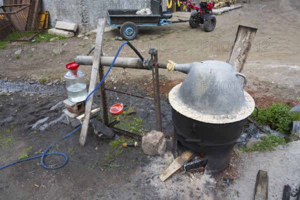 Self-built distillation plant on earthy soil, production of schnapps, Sameba, Kvemo Kartli region,