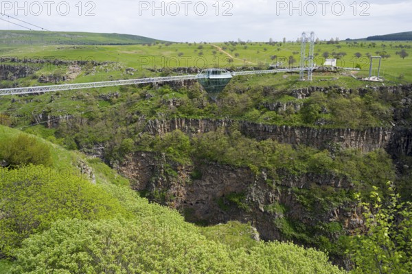 Landscape with bridge over deep gorge surrounded by green vegetation, diamond bridge, Diamond Glass