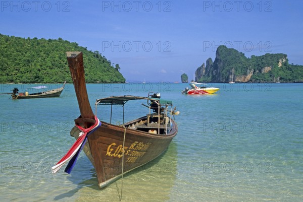 Longtail boat on Ko Phi Phi Don beach, two years in front of the tsunami, Thailand, December 2002,